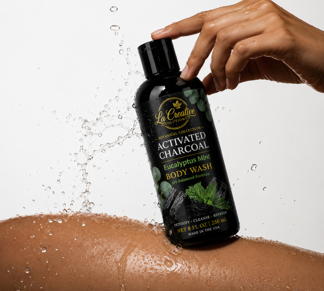 Eucalyptus Mint Activated Charcoal Body Wash in a matte black bottle with botanical ingredients pH balance